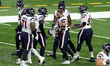 Houston Texans defensive end J.J. Watt (99) celebrates with teammates after making a touch...