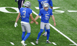 Detroit Lions kicker Matt Prater (5)  is congratulated by Detroit Lions punter Jack Fox (3...
