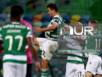 Pedro Goncalves of Sporting CP (C ) celebrates with teammates after scoring during the Portuguese League football match between Sporting CP...