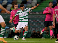 Pedro Goncalves of Sporting CP (L ) cshoots to score his second goal during the Portuguese League football match between Sporting CP and Mor...