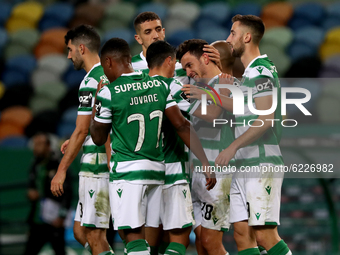 Pedro Goncalves of Sporting CP (2nd R ) celebrates with teammates after scoring his second goal during the Portuguese League football match...