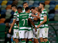 Pedro Goncalves of Sporting CP (2nd R ) celebrates with teammates after scoring his second goal during the Portuguese League football match...