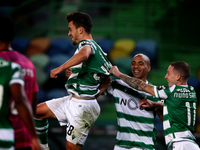 Pedro Goncalves of Sporting CP (C ) celebrates with teammates after scoring during the Portuguese League football match between Sporting CP...