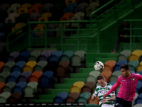 Nuno Santos of Sporting CP (L) vies with Matheus Silva of Moreirense FC during the Portuguese League football match between Sporting CP and...