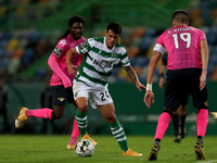 Pedro Porro of Sporting CP (L) vies with Steven Vitoria of Moreirense FC during the Portuguese League football match between Sporting CP and...