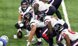 Houston Texans center Nick Martin (66) holds the ball at the line of scrimmage before a pl...