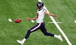 Houston Texans punter Bryan Anger (9) punts the ball during the second half of an NFL foot...