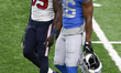 Houston Texans cornerback Keion Crossen (35) walks with Detroit Lions strong safety Duron...