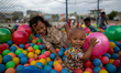 Children play at a slum area in Jakarta on 29 November, 2020. Indonesia’s economy is expec...