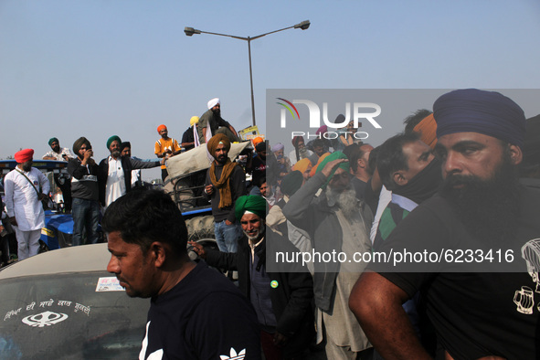 Farmers attend a protest against the Centre's new farm laws at Singhu border near Delhi, India on November 30, 2020. Farmers from Punjab, Ha...