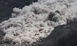 Sinabung volcano spews plumes of smoke and ash after a volcanic volcano alert level raised...