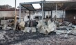 Remainings and ashes of the burned Moria refugee camp. The afthermath of Moria hotspot aft...
