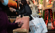 Shoppers in O'Connell Street Street in Dublin city centre, Taoiseach (Irish PM) Micheal M...