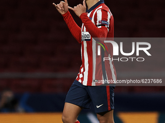 Joao Felix of Atletico Madrid celebrates after scoring his sides first goal during the UEFA Champions League Group A stage match between Atl...