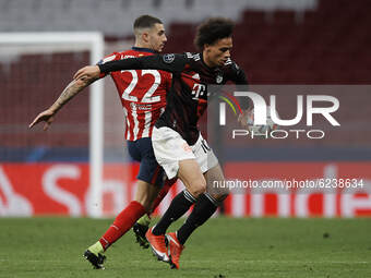 Leroy Sane of Bayern and Mario Hermoso of Atletico Madrid compete for the ball during the UEFA Champions League Group A stage match between...