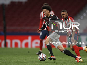 Leroy Sane of Bayern and Renan Lodi of Atletico Madrid compete for the ball during the UEFA Champions League Group A stage match between Atl...
