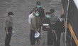 (L) Ivan Lam (R) Joshua Wong is seen entering a prison van at Lai Chi Kok Reception Centre...