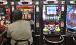 A Japanese man plays pachinko at a pachinko parlor, in downtown Tokyo, June 6, 2015. Pachi...