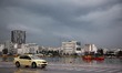A rainy day the port of Piraeus is uncrowded due to lockdown. At the background is the hig...
