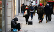 A homeless man sits on Oxford Street in London, England, on December 4, 2020. London has r...