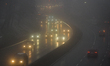 Friday evening busy traffic in Krakow seen from a bridge in misty weather.On Friday, Dece...