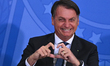 Brazil's president Jair Bolsonaro reacts during the swearing-in ceremony of the Brazil's T...