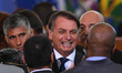 Brazil's president Jair Bolsonaro reacts after the swearing-in ceremony of the Brazil's To...