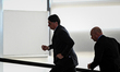 Brazil's president Jair Bolsonaro runs on the Planalto Palace ramp as he leaves the sweari...