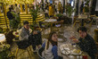 People are seen eating at a restaurant on December 21, 2020 in Hong Kong, China. Hong Kong...