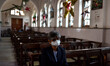 People during th Christmas Mass, in Kolkata, India, on December 25, 2020 amid the Covid-19...