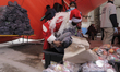 A volunteer from the Community of Sant'Egidio in Mexico,
characterized as Santa Claus to...