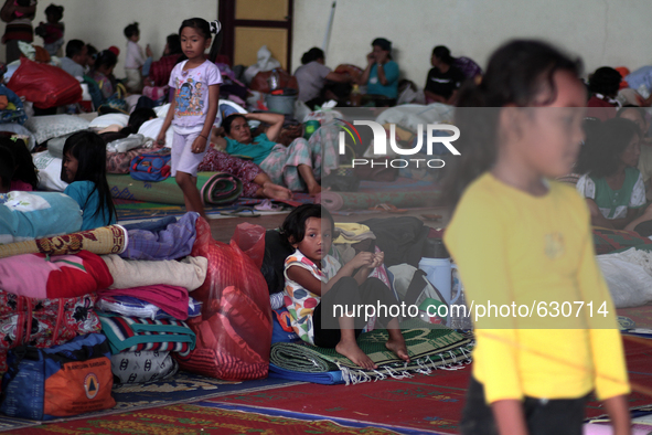 An image available on June 8, 2015 Karo girl resting in temporary shelters after they were evacuated from the memorial raised to the highest...