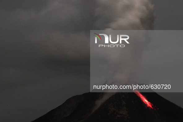 An image available on June 8, 2015 with a long exposure, which shows the Sinabung volcano constantly launching and lava spews volcanic smoke...