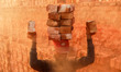 A man stacks more bricks on his head while working at in brickfields Narayanganj near Dhak...