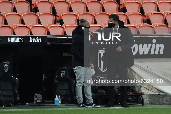 Javi Gracia head coach of Valencia and Alvaro Cervera head coach of Cadiz  greets during the La Liga Santander match between Valencia CF and...