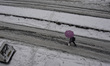 A man walks with an Umbrella amid heavy snowfall as snowfall contimues for third day in Sr...