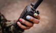 Cute reports by radio to the operations room after her foot patrol in the Balule reserve,...