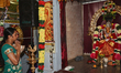 Tamil Hindu devotees offer prayers to Goddess Sri Nagapooshani Amman at a Tamil Hindu temp...
