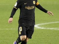Lionel Messi of FC Barcelona in action during the La Liga Santander match between Granada CF and FC Barcelona at Estadio Nuevo Los Carmenes...