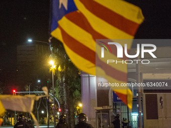 Police is seen behind the Catalan independence flag.
Close to the elections of the Generalitat of Catalonia, the Spanish extreme right-wing...
