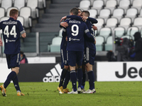Cristiano Ronaldo of Juventus FC celebrates with teammates after scoring during the Serie A football match between Juventus FC and US Sassuo...