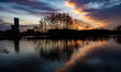 Sunrise sky ovre the lake with reflection on the water. Early morning daily life in the Ne...