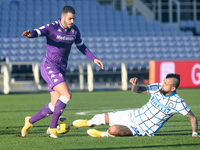 Valentin Eysseric of ACF Fiorentina and Arturo Vidal of FC Internazionale compete for the ball during the Coppa Italia match between ACF Fio...