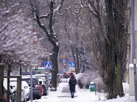 People are seen walking after snowfall in Warsaw, Poland on January 13, 2021. Though temperatures normally reach below zero in January in Po...