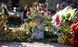 Figurines and flowers seen at the memorial commemorating more than 200 children from Betha...