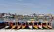 Stranded shikaras remain stuck in ice inside t frozen Dal Lake, Srinagar, Indian Administe...