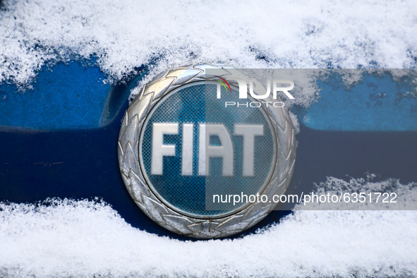 Fiat car emblem is covered with snow in Krakow, Poland. January 15, 2021. 