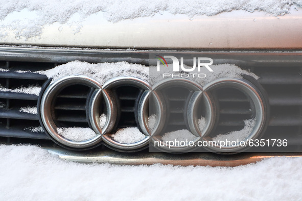 Audi car emblem is covered with snow in Krakow, Poland. January 15, 2021. 