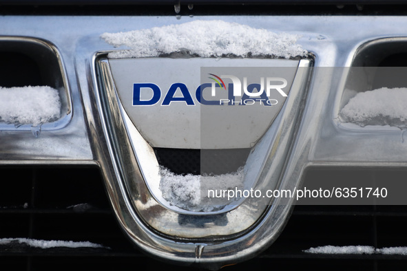 Dacia car emblem is covered with snow in Krakow, Poland. January 15, 2021. 
