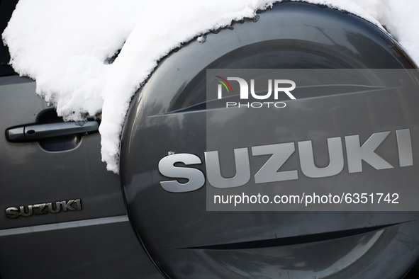 Suzuki car emblem is covered with snow in Krakow, Poland. January 15, 2021. 